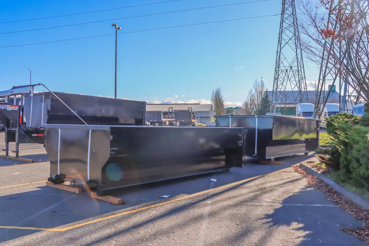 Roll-off dumpster ready for waste disposal at job site for Construction Dumpster Rental in Palmetto Bay